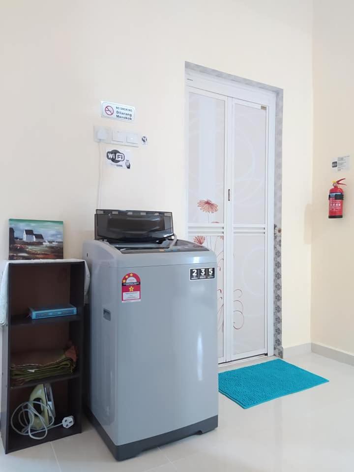Topville Homestay Kangar Extérieur photo