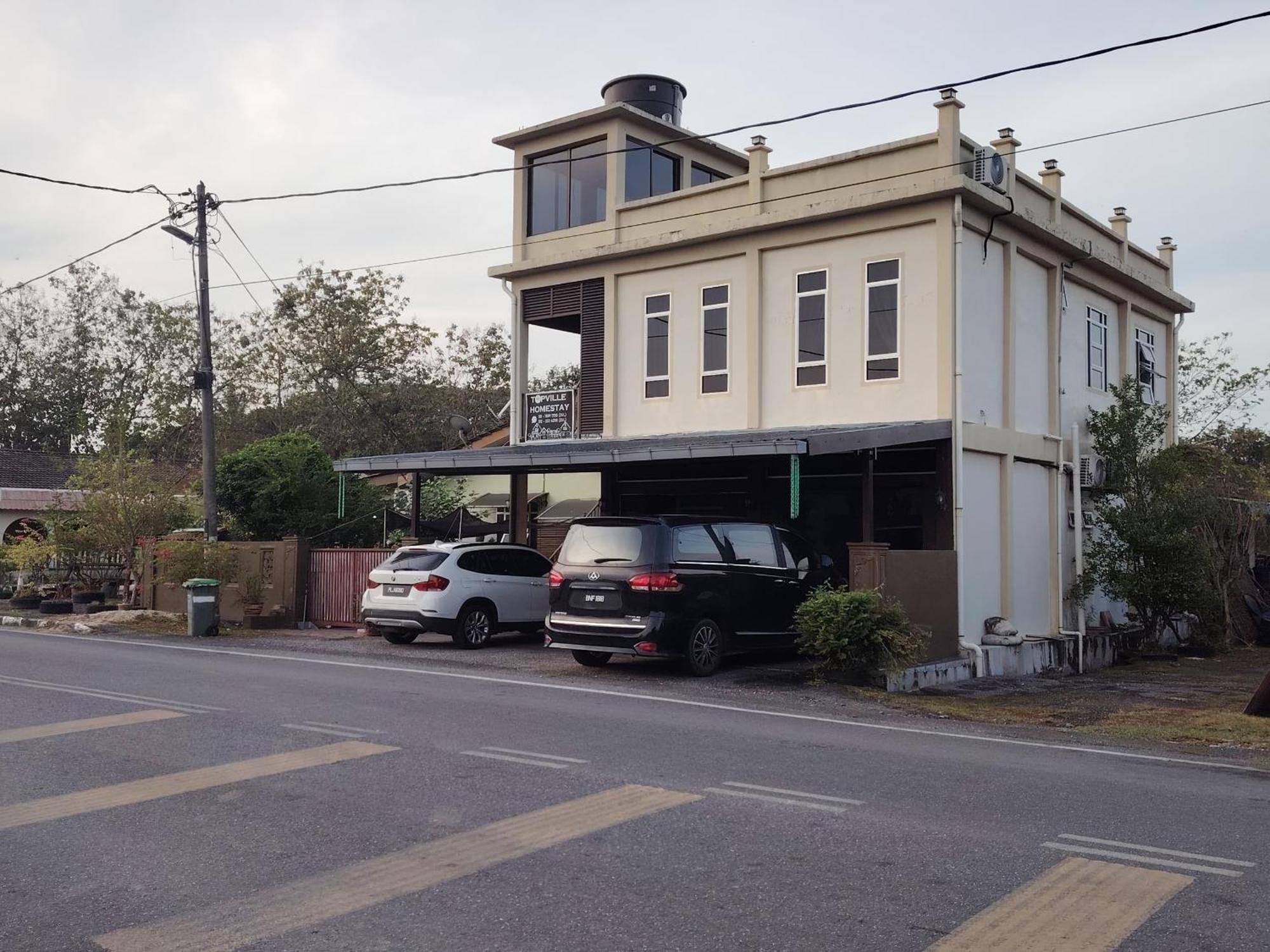 Topville Homestay Kangar Extérieur photo